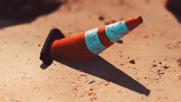 Traffic Safety Cone at Empty Sand Beach