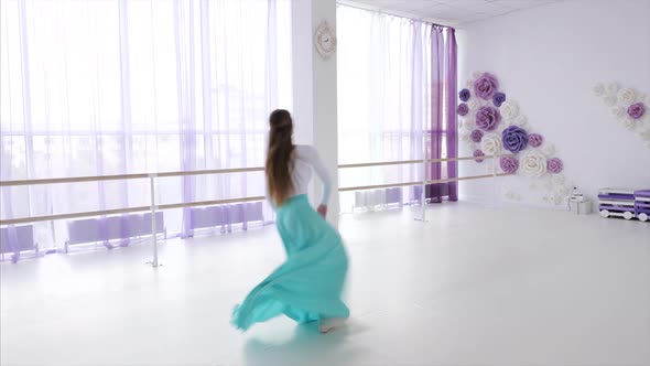 Ballet Dancer is Rehearsing a Dancing Elements