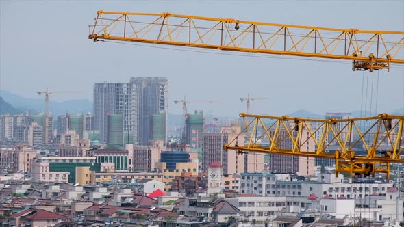 Yellow Crane and Residential Building Under Construction in China