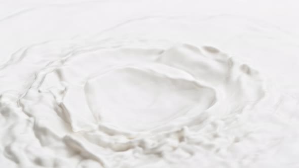 Super Slow Motion Detail Shot of Waving Fresh Cream at 1000 Fps