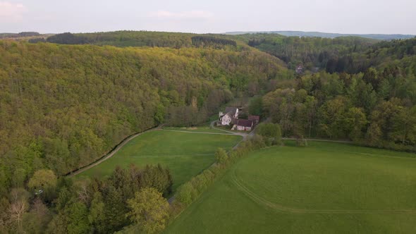 drone flight over the meadows of a large farm in the German Wetzlar which is located in the Hesse re