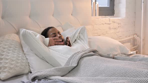 Young African Girl Waking Up in Morning and Stretching Her Body