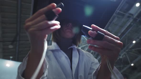 A Girl Surgeon Performs an Operation on a Patient in Virtual Reality