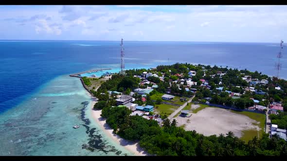 Aerial drone sky of luxury lagoon beach holiday by transparent ocean with white sand background of a