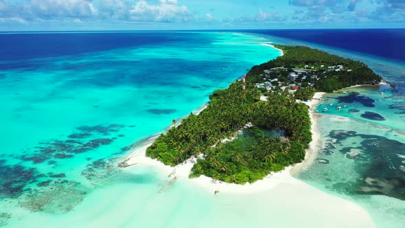 Luxury aerial clean view of a paradise sunny white sand beach and blue ocean background in vibrant 4