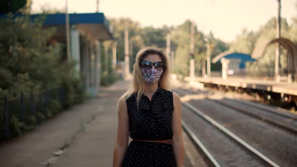 Woman In Mask Protection Epidemic Coronavirus On Public Transport Station. Girl Waiting Train.