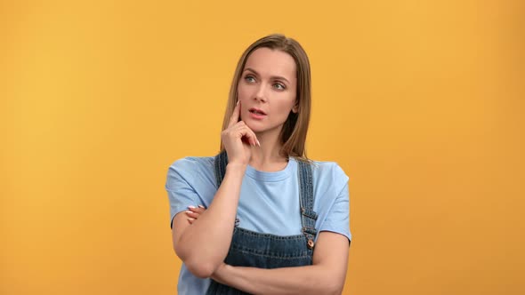 Portrait of Pensive Casual Woman Thinking Solving Problem Planning Making Decision Posing Isolated