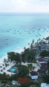 Boat Boats in the Ocean Near the Coast of Zanzibar Tanzania Slow Motion Vertical Video