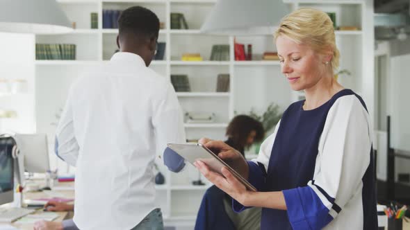 Business woman on her touch pad