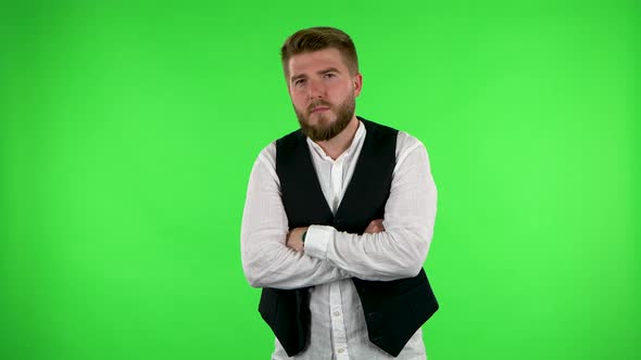 Man Listens Attentively and Nods His Head Approvingly. Green Screen