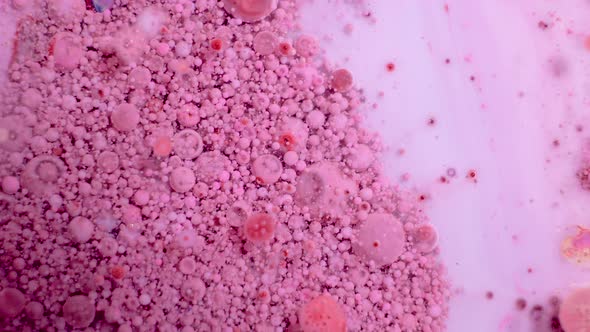 Slow Motion of Bright Colored Bubbles alt