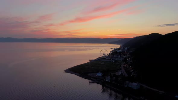 Aerial Footage of Flight Over the Sea at Sunset