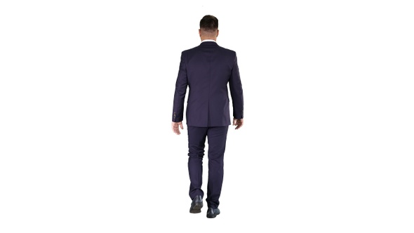 Confident businessman walking on white background.