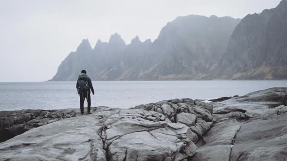 Hiker Backpack Rocks By Fjord