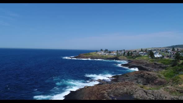 Aerial footage of Keleula Head near Kiama in regional New South Wales in Australia