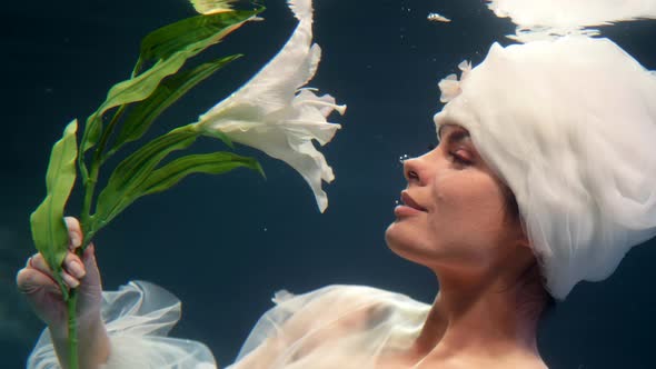 Underwater Flower Fairy with Beautiful White Lily Stunning Mysterious Woman and Tender Blossom