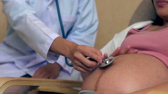 Pregnant Woman and Gynecologist Doctor at Hospital