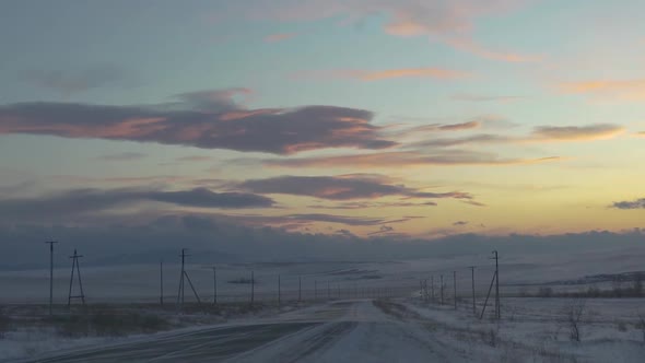 Winter Road at Sunset 