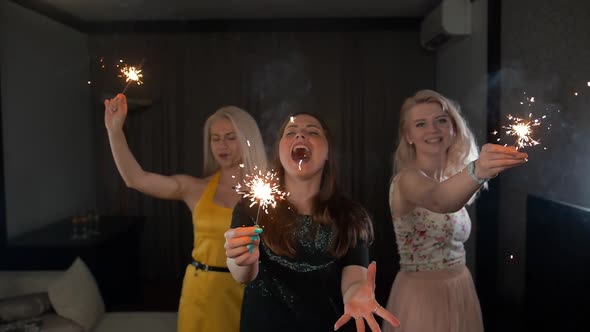 Ladies Happy Dancing with Sparklers.