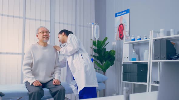 Asian senior man patient visit and consult health problem with doctor during appointment