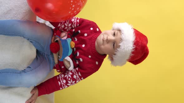 Vertical Portrait Emotion Cute Cheerful Funny Preschool Baby Boy Laughing Fooling Around In Santa