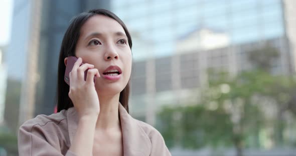 Woman talk to mobile phone