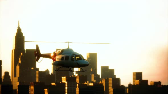 Silhouette Helicopter at City Scape Background