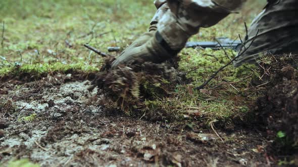 Soldiers Prepare a Trench in a Pine Forest