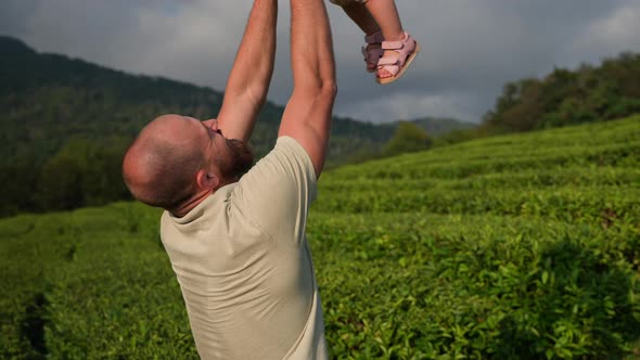 Dad with Little Daughter Having Fun Outdoors