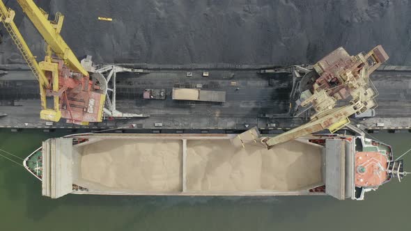 Cargo Loading to Bulk Carrier Using Port Crane