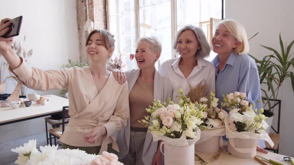 Four Women Making Selfie in Floristic Studio