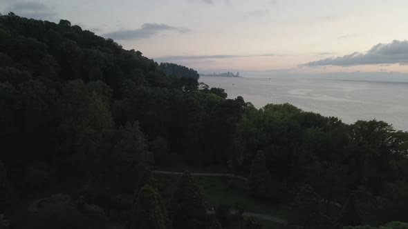 Aerial view of Green cape and Botanical garden of Batumi at sunset. Georgia 2021