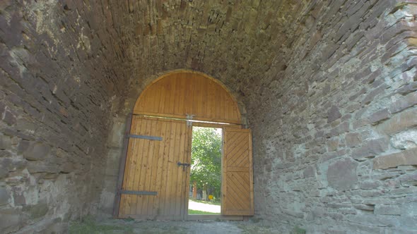 Wooden door and stone walls