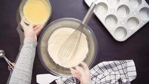 Time lapse. Step by step. Top view. Baking cornbread muffins.