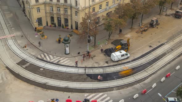 Asphalt Paver, Roller and Bulldozer on the Road Repair Site During Asphalting Timelapse. Road