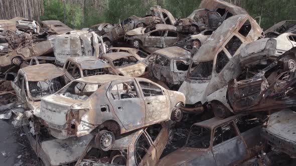 War in Ukraine a Dump of Burned Cars in Irpin Bucha District