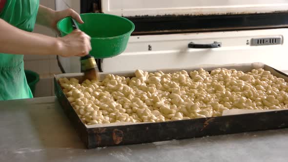 Raw Dough Products on Oven Tray