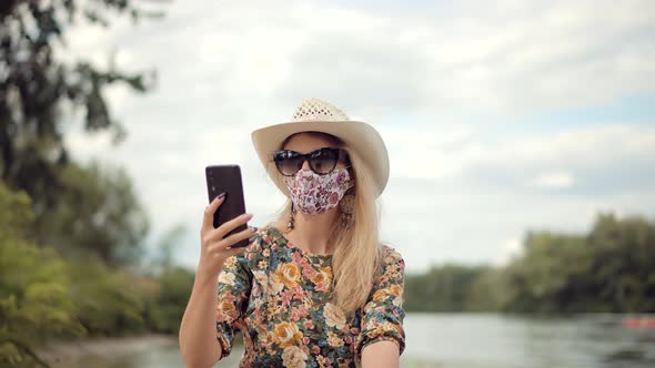 Woman In Sunglasses Using Mobile Phone And Call To Husband. Girl Talking On Cellphone Or Smartphone.