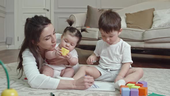 Mother Spending Time with Son and Daughter alt