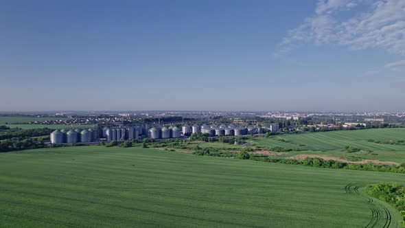 Aerial View New Grain Elevator and a Field in the Foreground