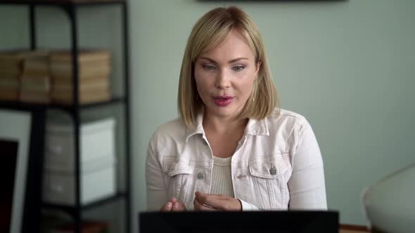 Woman Is Consulting By Internet, Talking To Web Camera, Psychologist Consultant Is Working Remotely