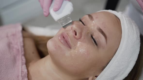 Close View of Woman During Cosmetological Ultrasonic Facial Cleansing