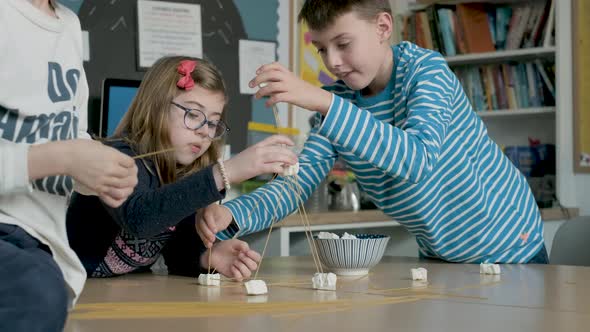 Children setting up construction during a science lesson