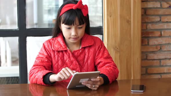 Girl Using Tablet