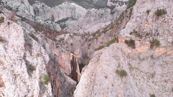 Spectacular rocky mountains. Aerial drone view of narrow mountain canyon.