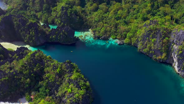 Rocky Mountains with Big Paradise Lagoons in El Nido, Palawan, Philippines. Aerial View 