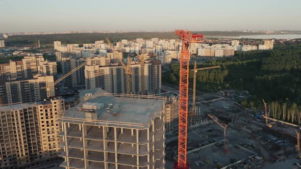 Aerial, drone moving around the monolith house in construction process