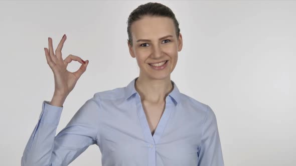 Young Businesswoman Gesturing Okay Sign