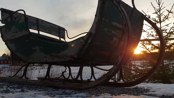 Motorized slider shot of antique christmas sled