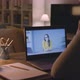 Woman watching online courses on her laptop - VideoHive Item for Sale